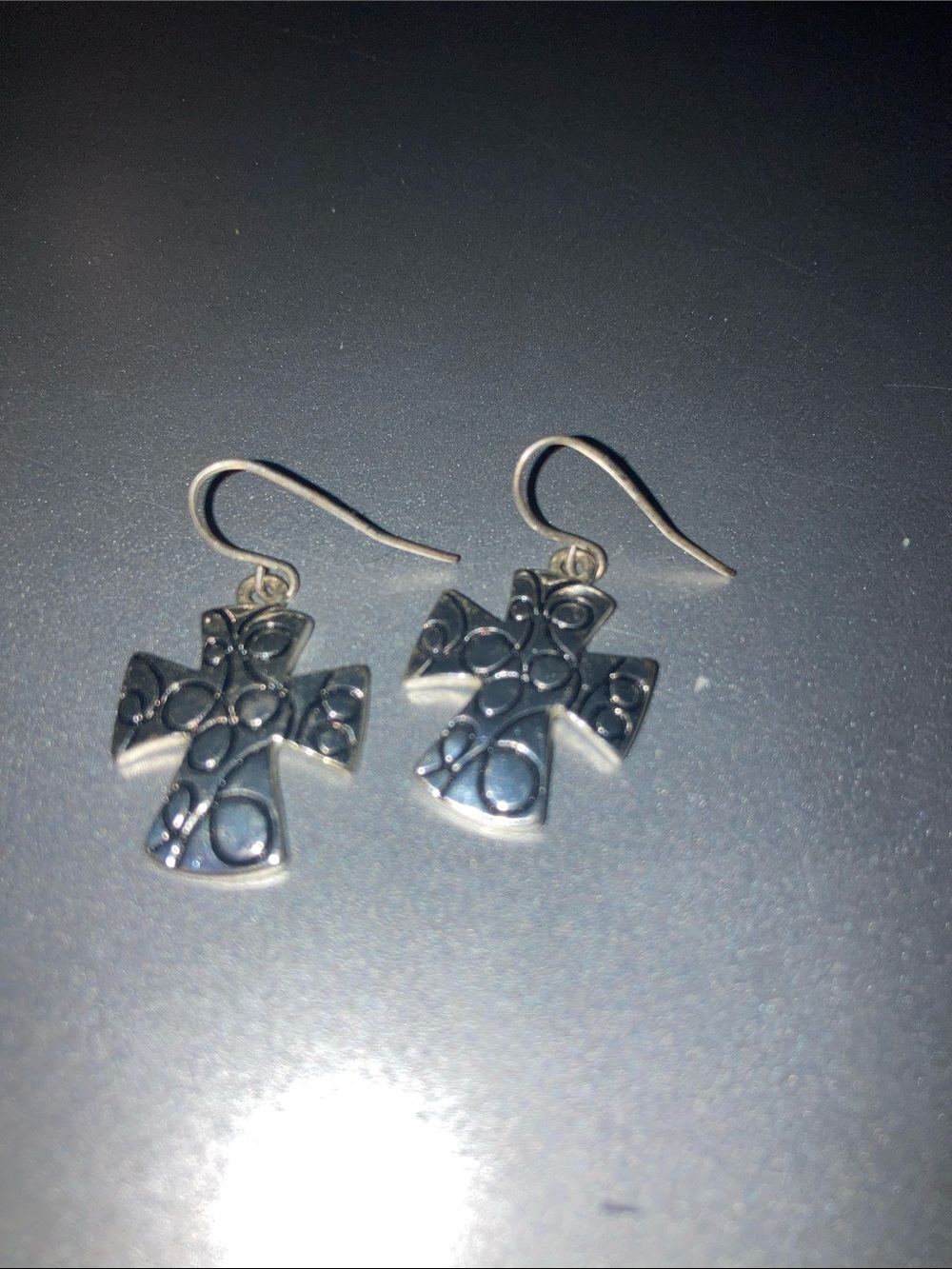 Silver toned cross earrings
